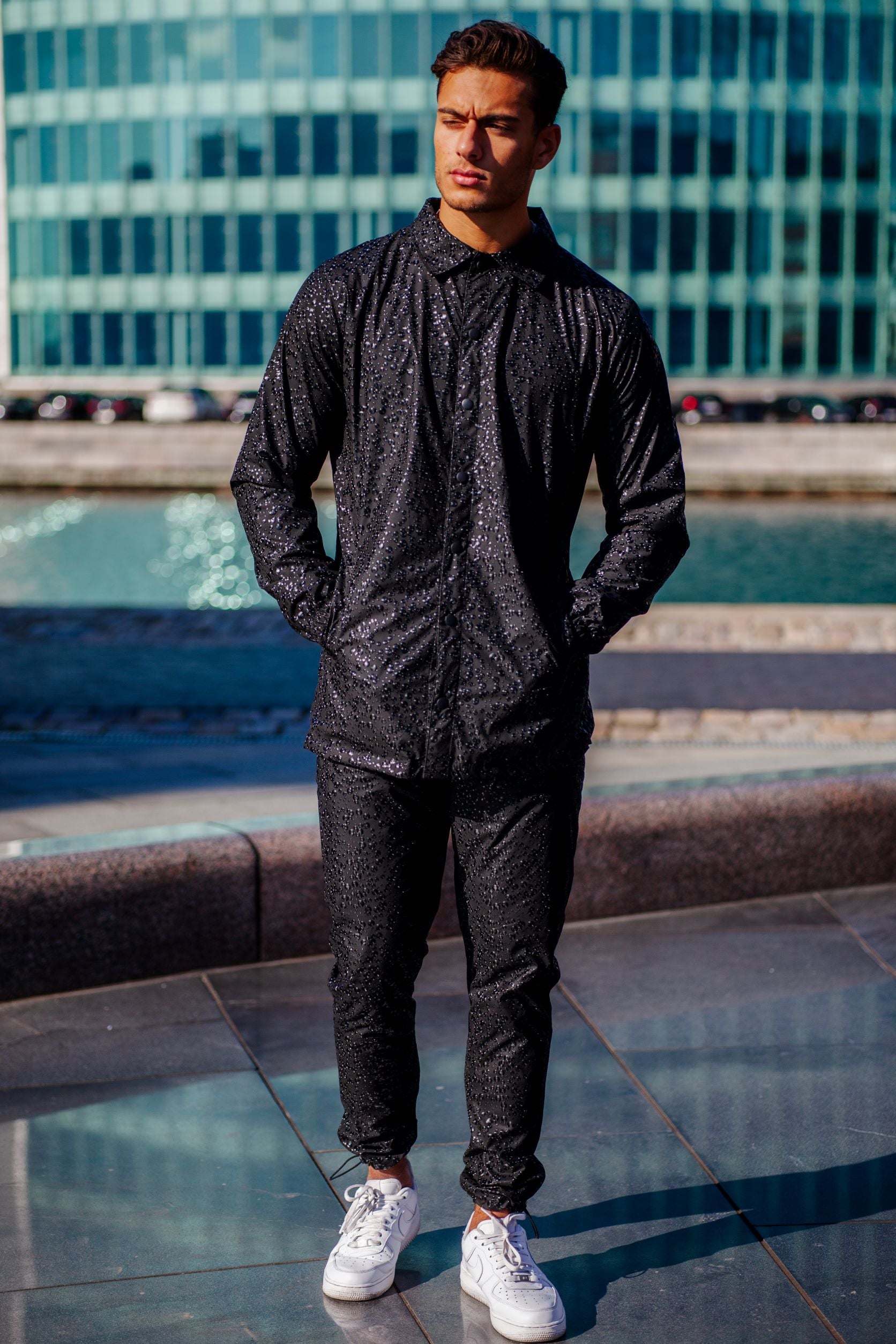 Black waterproof jacket with drop effect